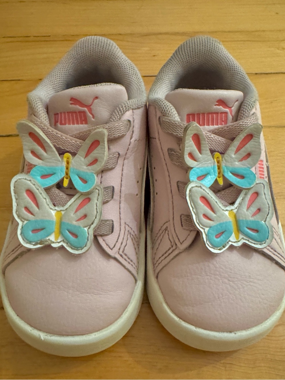 Puma Kids Pink Sneakers with Blue & Yellow Butterfly Accents